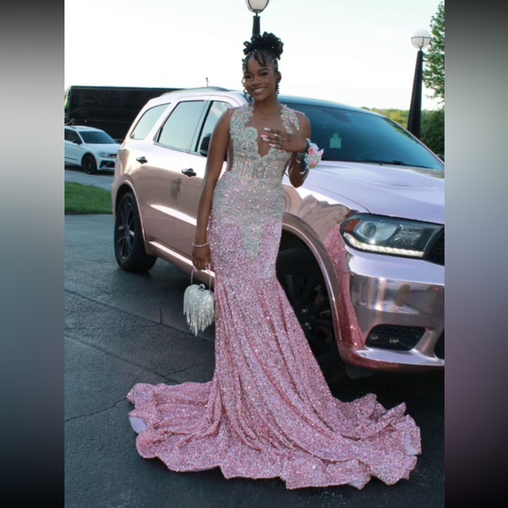 Pink prom dress worn once size small GREAT condition no less then 500 for offers